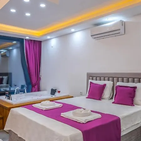 Guenes Kalkan * Kas